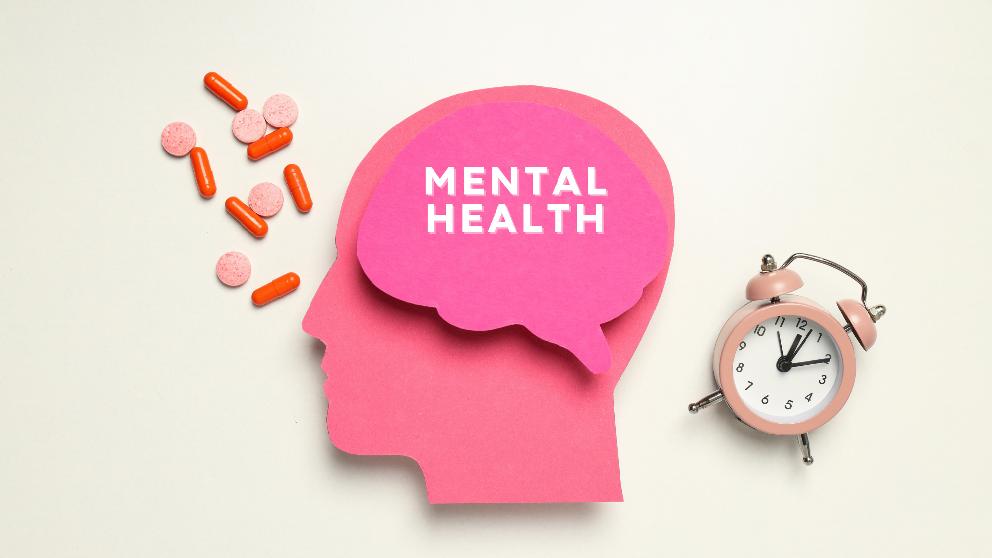 Head with brain that says mental health. Loose Pills Next to it and an alarm clock on the other side.