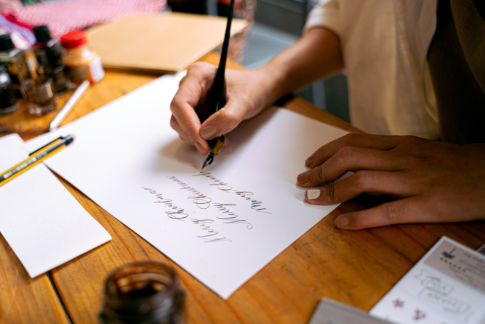 Image of someone writing a will
