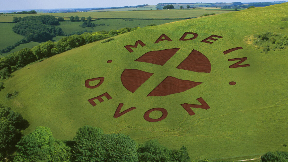 A field with made in devon’s logo on it A field with made in devon's logo on it